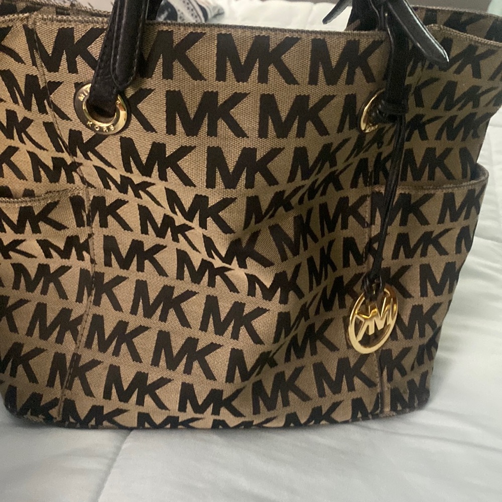 Michael kors still has a lot life to it , fair shape